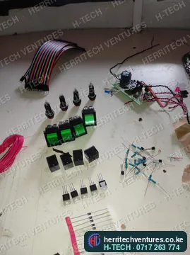 Relays, switches and indicator parts laid out for a batch of H-TECH controllers, June 2022