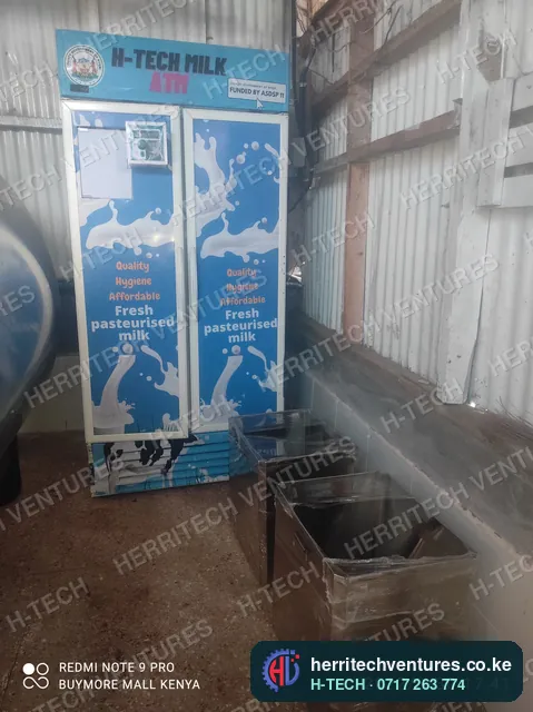 A double-door milk ATM with its stainless milk tanks, March 2022