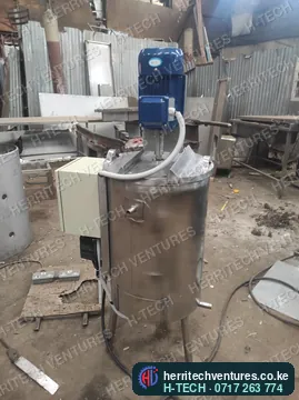 A milk pasteurizer with its stirrer motor and control box in our workshop, September 2022