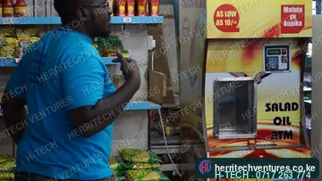 Our team setting up the salad oil ATM for the supermarket, January 2019