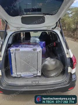 A machine and its stainless tank loaded for delivery, October 2022