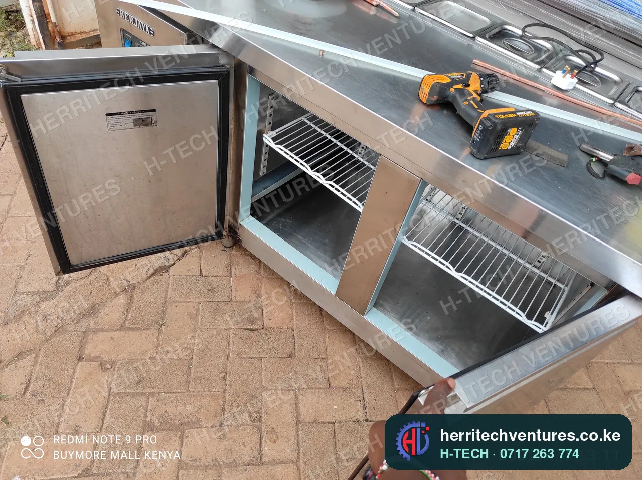 A stainless steel refrigerated counter under fabrication, April 2022