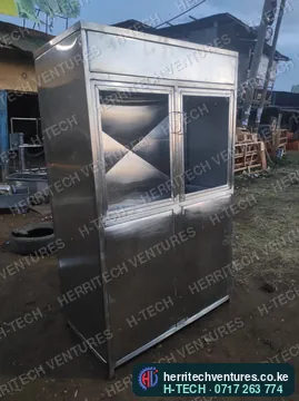 The stainless cabinet outdoors, March 2023