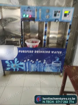 A branded water refilling station with three refill bays, July 2022