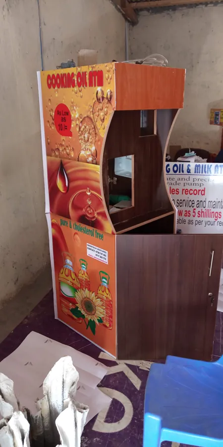 A finished Herritech cooking oil ATM in an MDF cabinet, September 2018